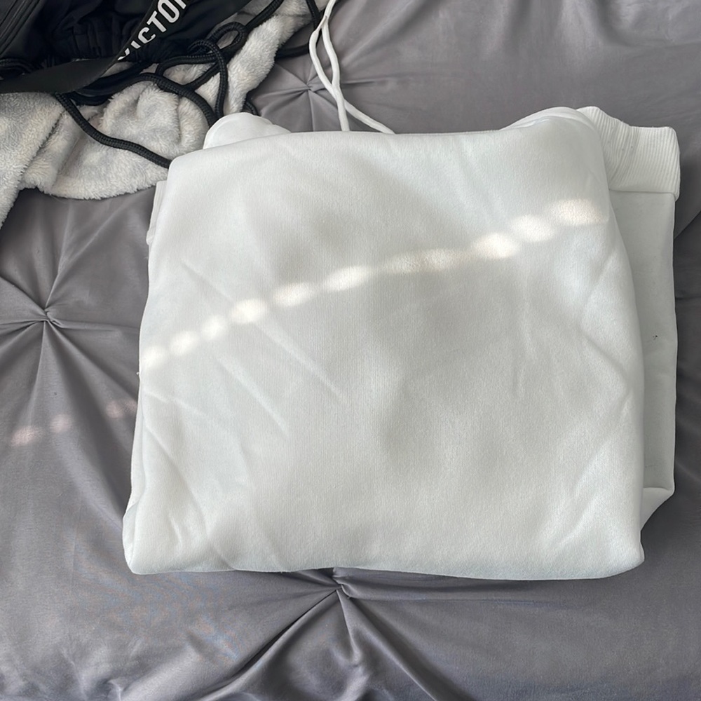 White hoodie from shein. It is an extra large.